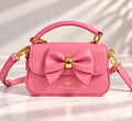 Blush Pink NERIAH Bow Bag with gold hardware
