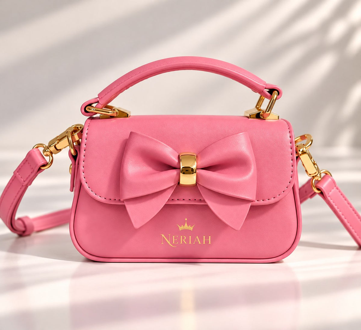 Blush Pink NERIAH Bow Bag with gold hardware