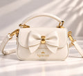 Ivory NERIAH Bow Bag with gold hardware