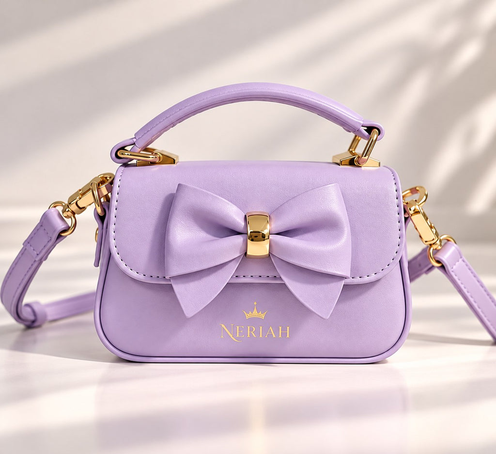 Lavender NERIAH Bow Bag with gold hardware
