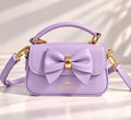 Lavender NERIAH Bow Bag with gold hardware